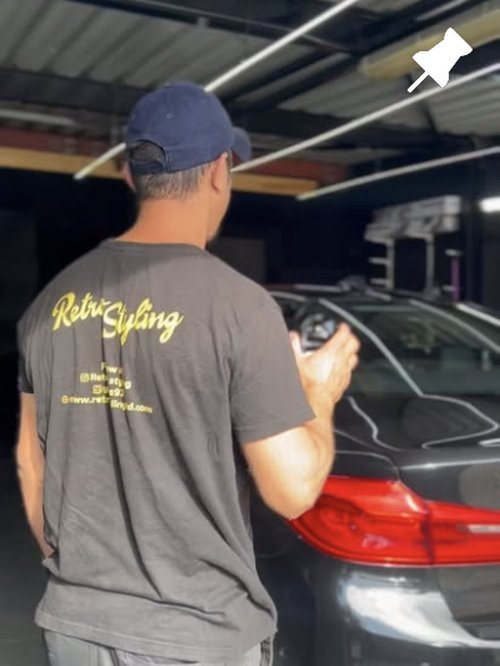 Retro Styling technician working on BMW — Highgate studio